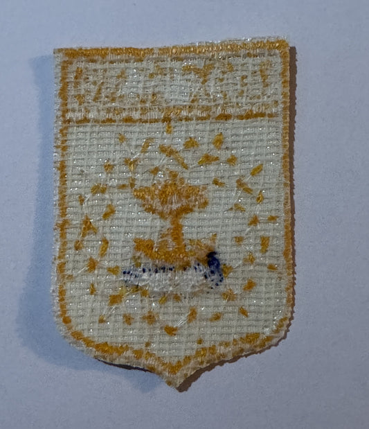 Reverse of the Rhode Island patch showing open weave backing and no iron-on adhesive