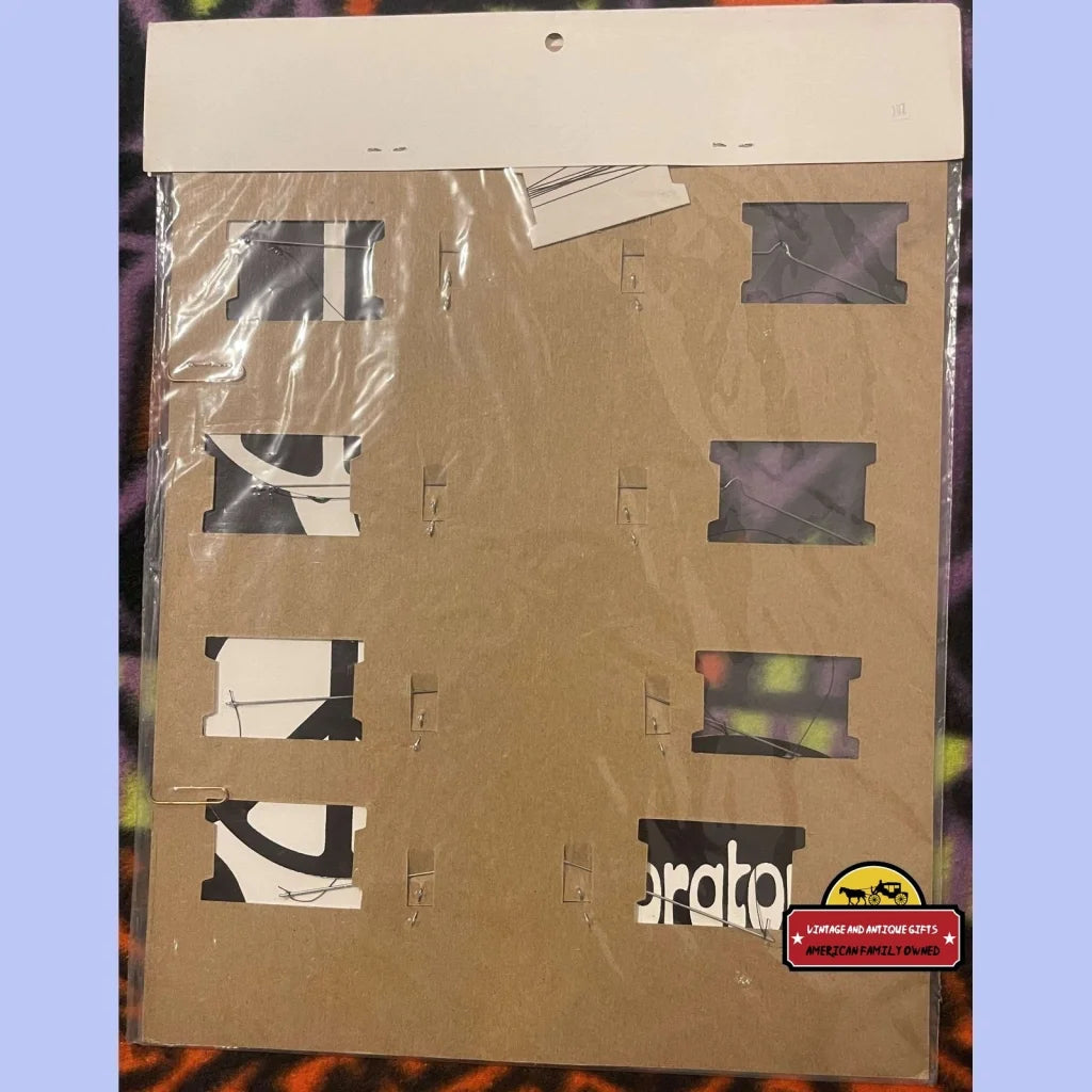 Cardboard packaging with cutouts revealing a Rare 1960s Vintage Peace Wonder Mobile