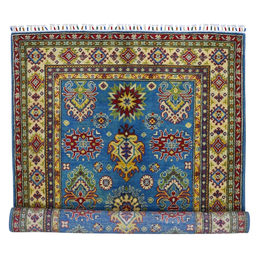 Vibrant blue Afghan Kazak rug with cotton foundation and colorful patterns