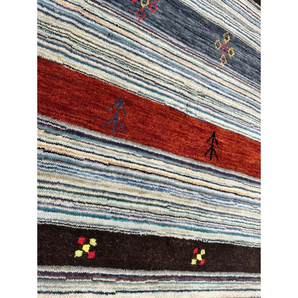 Vibrant Indo Gabbeh rug with blue-beige-rust stripes and bold geometric motifs