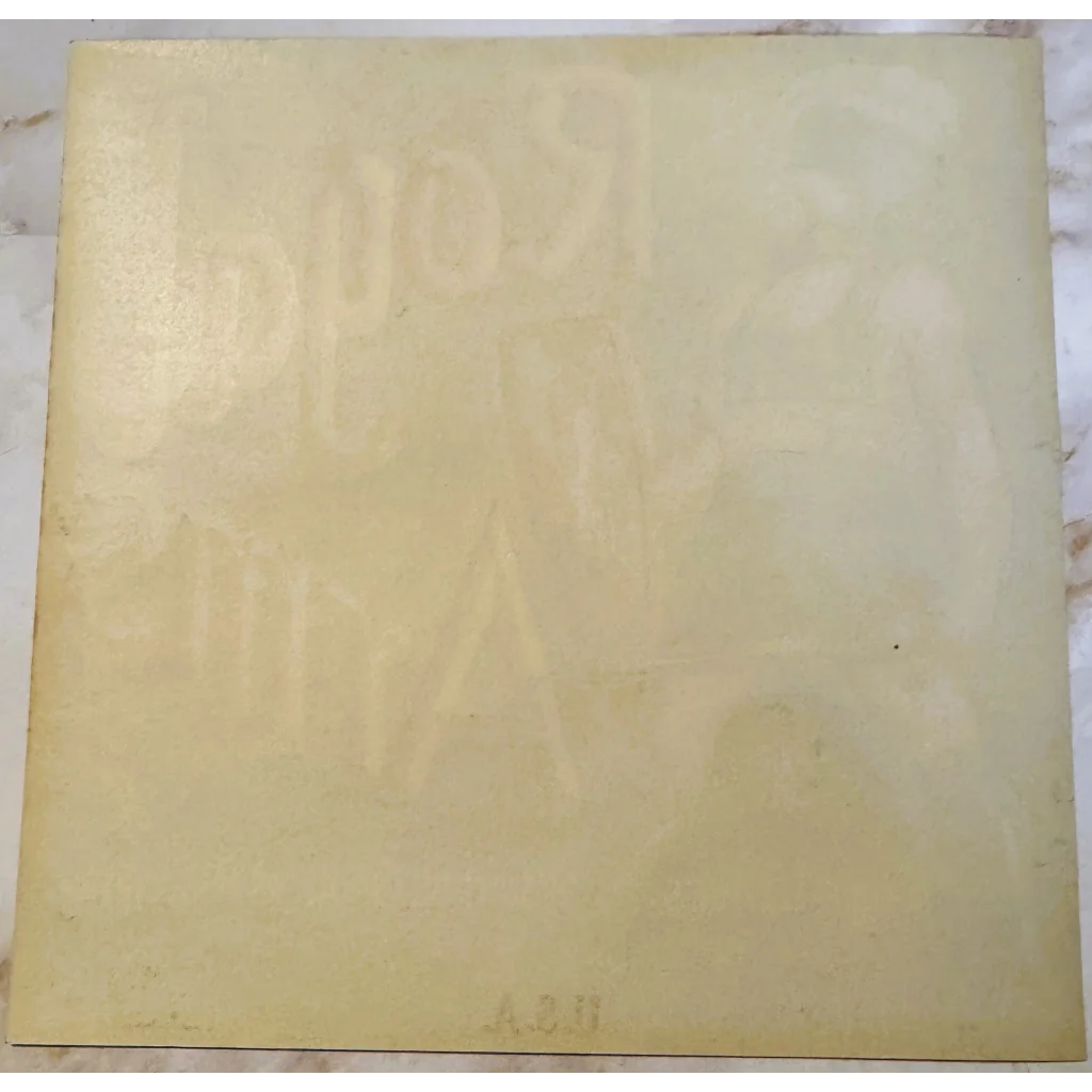 Blank cream-colored canvas with slight discoloration for Vintage 1930s Roman Warrior label