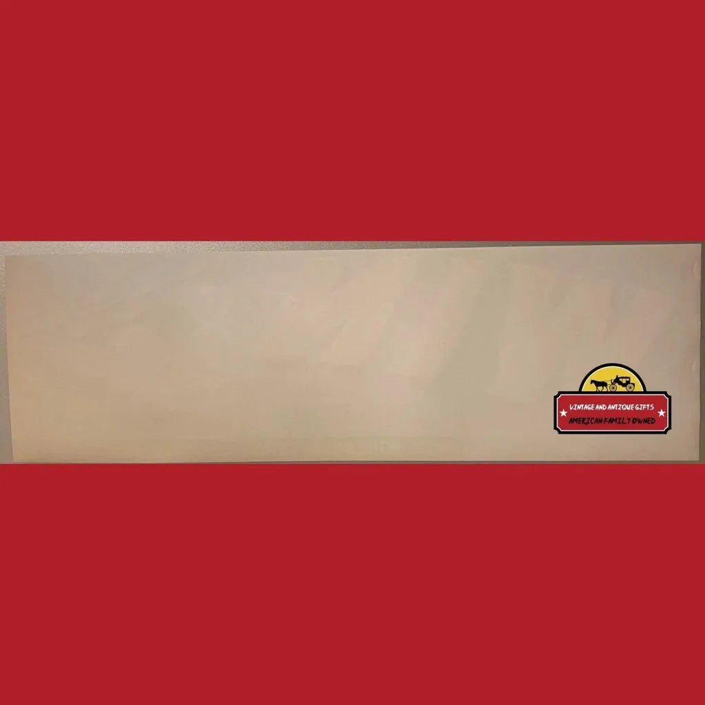 Beige wooden board with a vibrant sticker showcasing the Win Crate label design