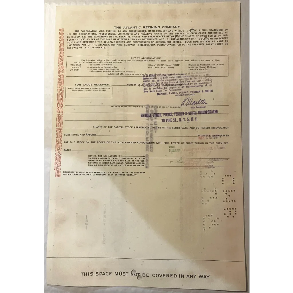 Vintage Atlantic Refining Company document showcasing fields and stamps for stock certificate