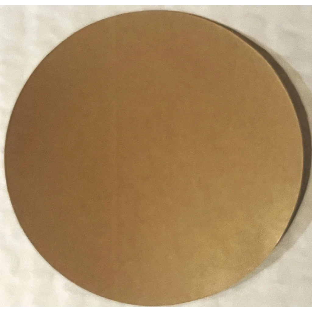 Circular gold metallic disc from the Rare 1968 Nixon Good Loser Sticker collection