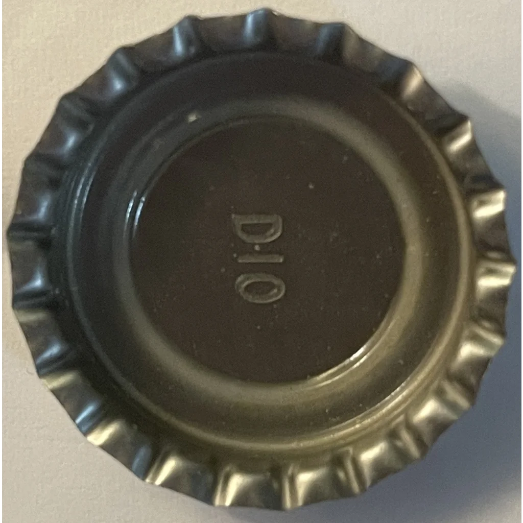 Metallic DIO embossed bottle cap from the 1970s Rare YUP Soda collection