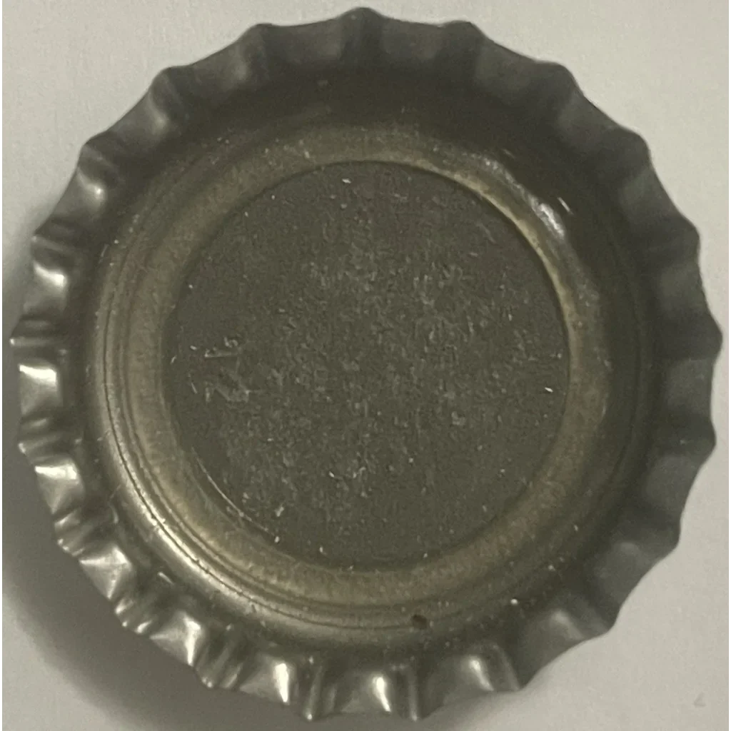 Metal bottle cap with ridged edge, perfect for Vintage Nehi Peach collectors from Jefferson NC
