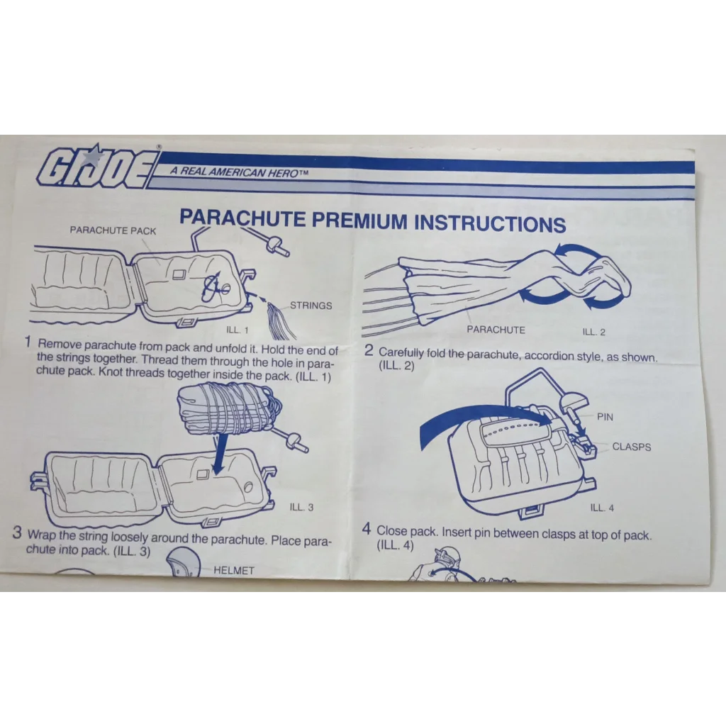 Vintage 1984 GI Joe parachute pack with gas mask, helmets, and premium instructions manual