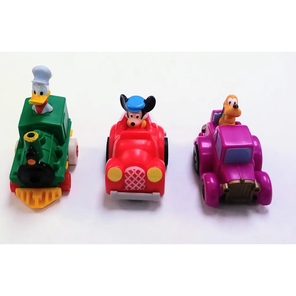 Vintage 1988 McDonalds Happy Meal Toy: Donald Duck chef on green motorcycle