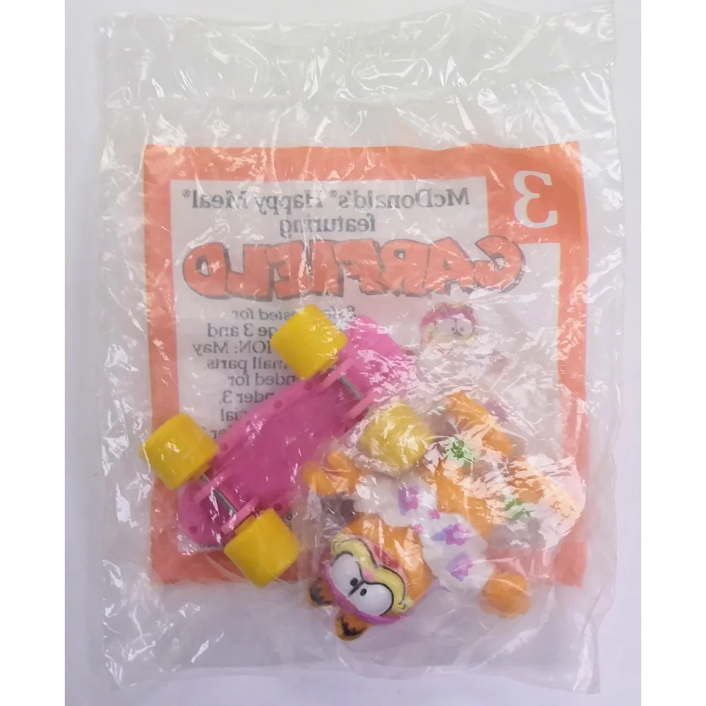 Vintage 1988 McDonald’s Happy Meal Toy: Pink Yellow Dinosaur on Wheels