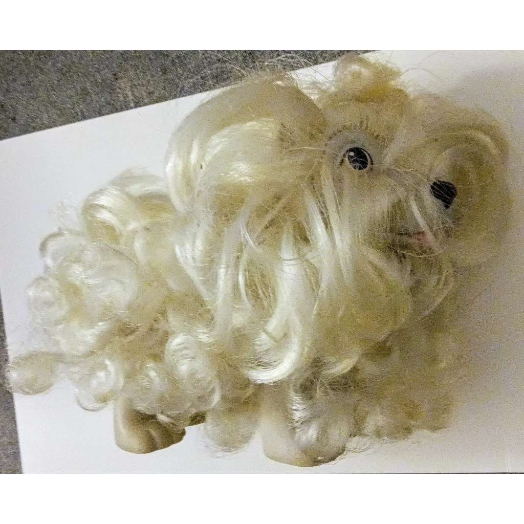 Vintage 1989 Hasbro Sweetie Pups Schnauzer toy with white curly wig