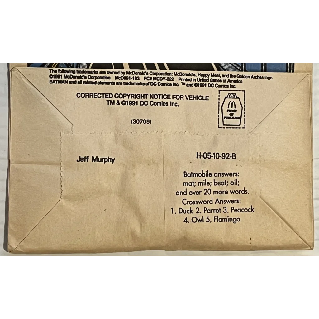 Envelope with details for a Rare 90s Batman Happy Meal Bag featuring the Batmobile