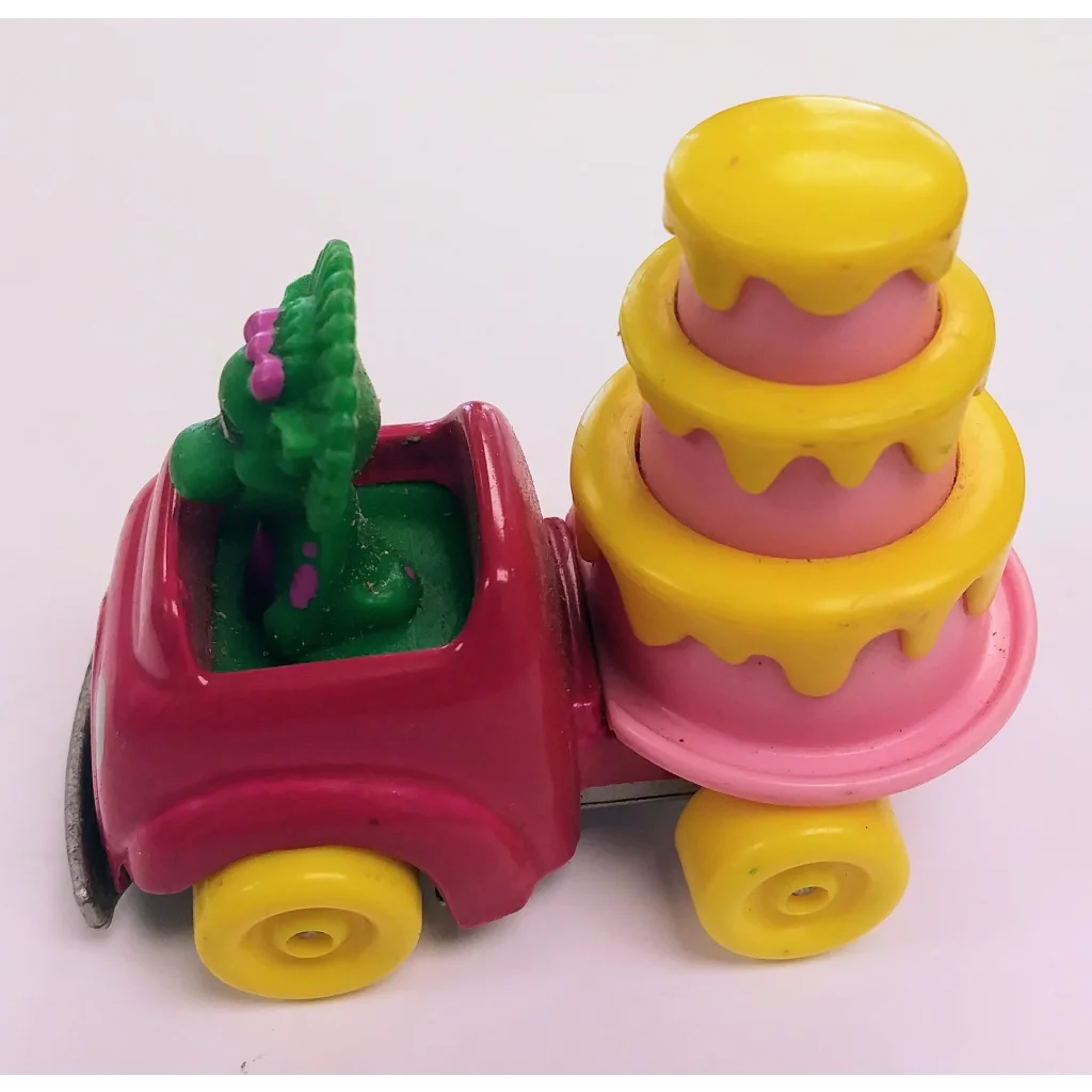 Vintage 1993 Barney die cast vehicle with Baby Bop and cake