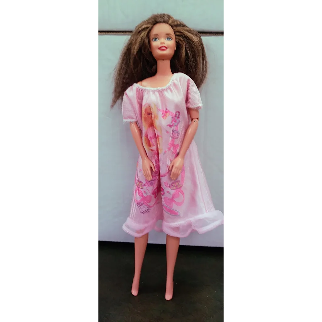 Vintage 1993 Twist N Turn Barbie Doll in pink floral pajama set