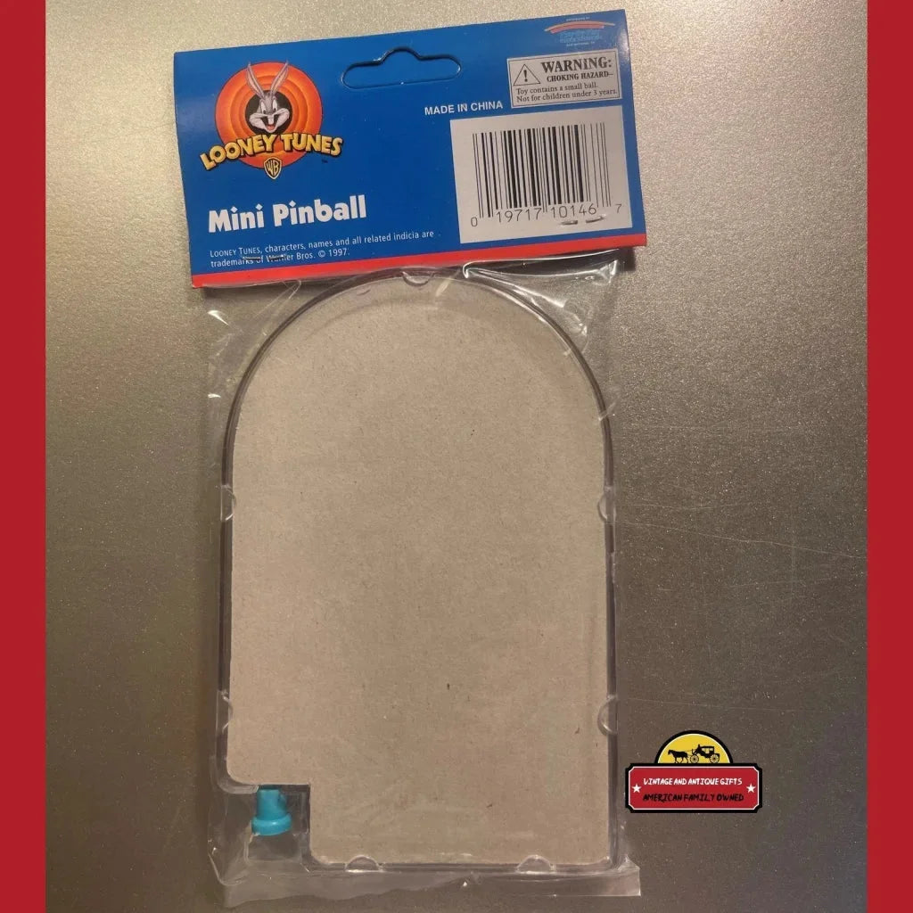 Unopened 1997 Looney Tunes Mini Pinball Game in clear packaging with logo