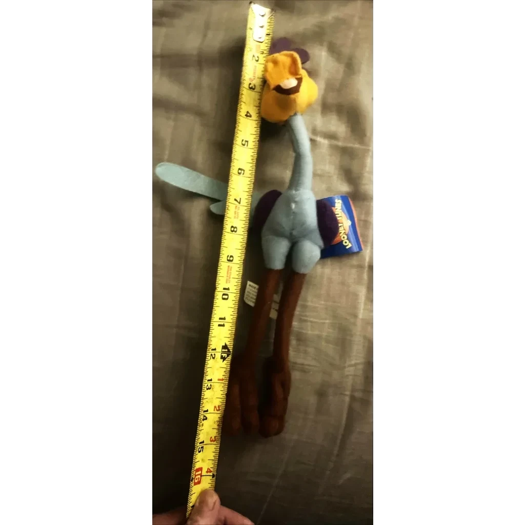 Plush Looney Tunes Roadrunner toy with a long neck and legs, original tag included