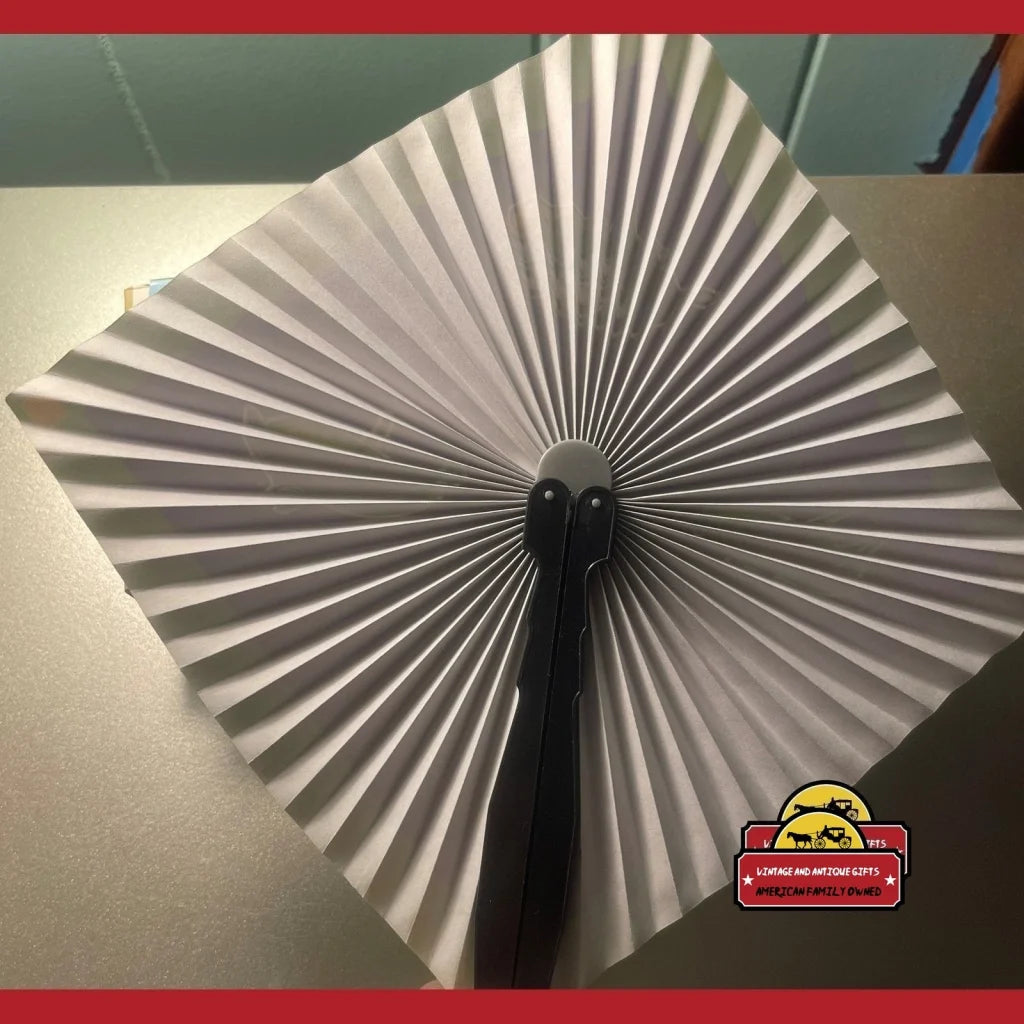 Vintage Baltimore Orioles MLB folding fan with googly eyes and black handle