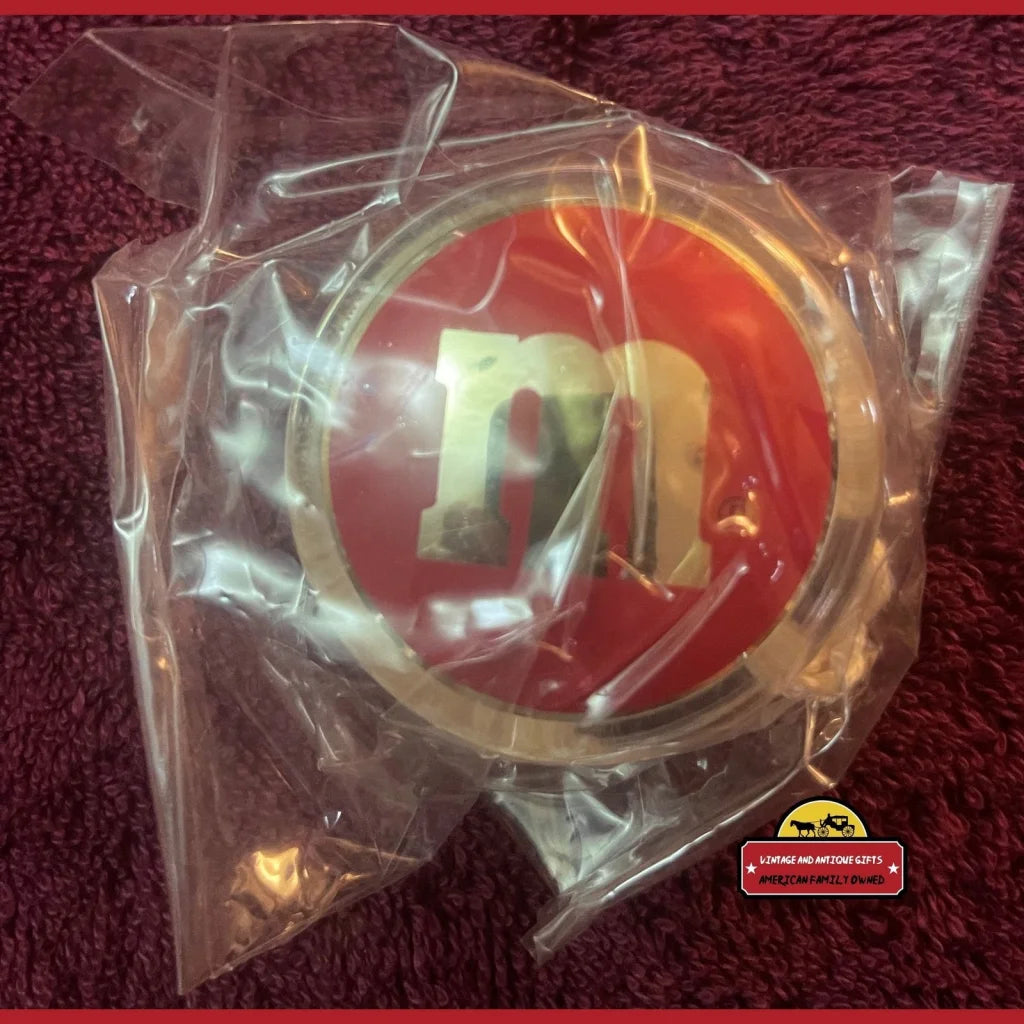 Red and yellow M&M Yo-Yo logo in clear packaging, a rare Y2K collectible from 2000