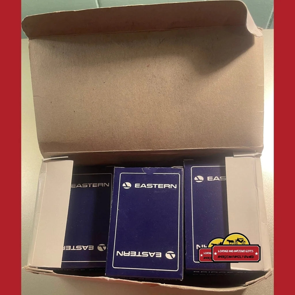 Box of Vintage Eastern Airlines Playing Cards with a luggage tag for collectors