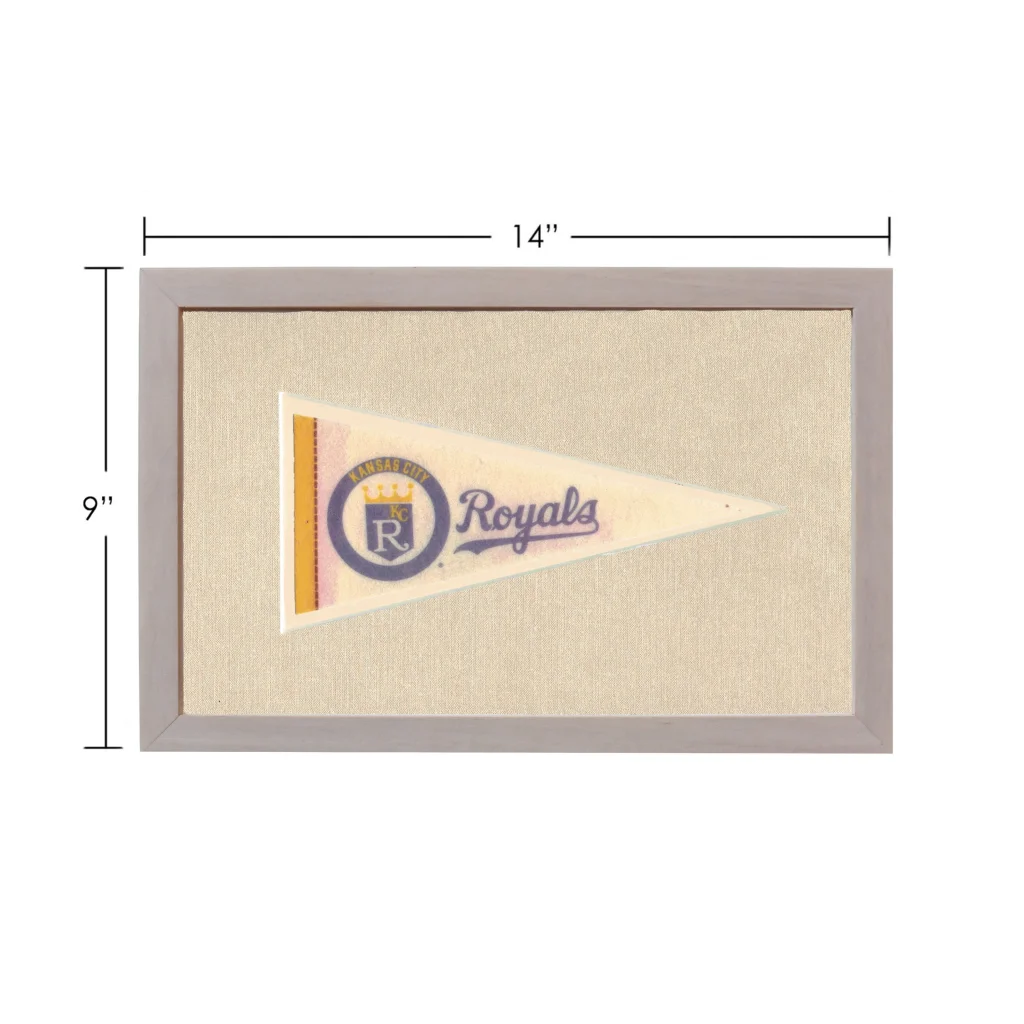 Vintage Kansas City Royals pennant in cream with purple gold logo, gray frame