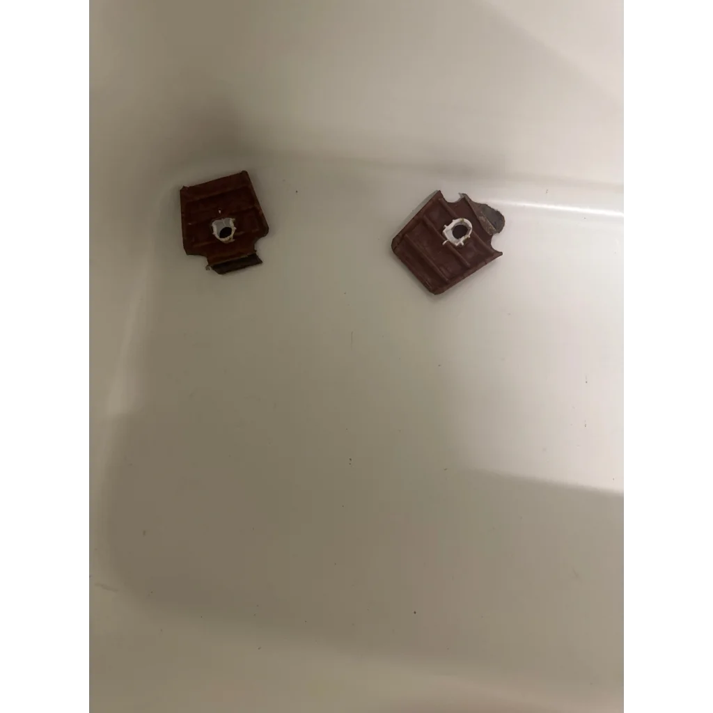 Broken dark chocolate with white filling on Vintage Lappas Genuine Leather Igloo Cooler