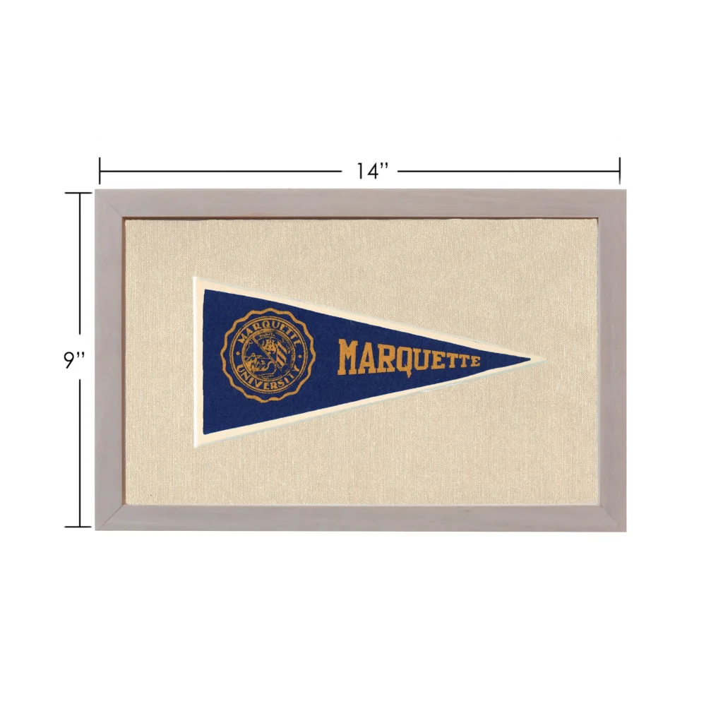 A navy blue vintage marquette university pennant with gold lettering and emblem framed in a light gray border