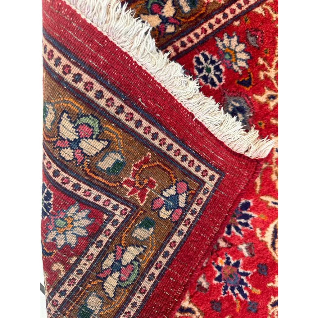 Vintage Mashhad rich red Persian runner rug with floral patterns