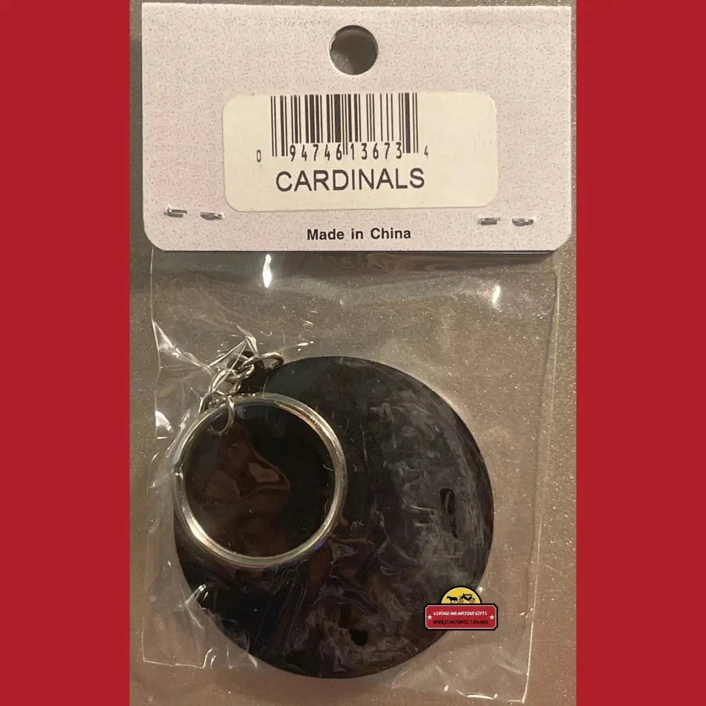 Black circular Cardinals keychain featuring the classic St. Louis Cardinals logo