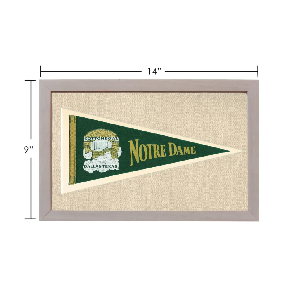 Vintage Notre Dame pennant in green and gold, framed in light gray