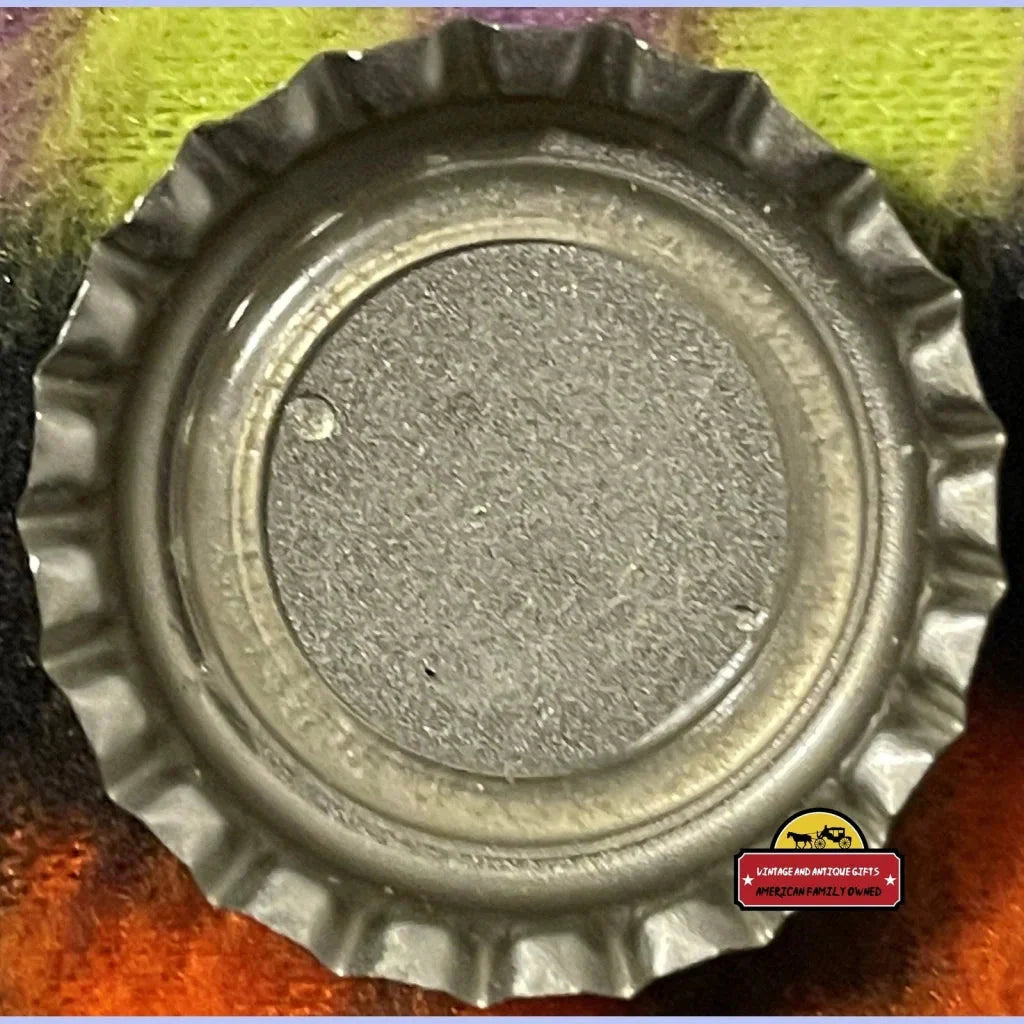 Metal beer bottle cap from the Rare 1960s My Pops Root Beer with festive design