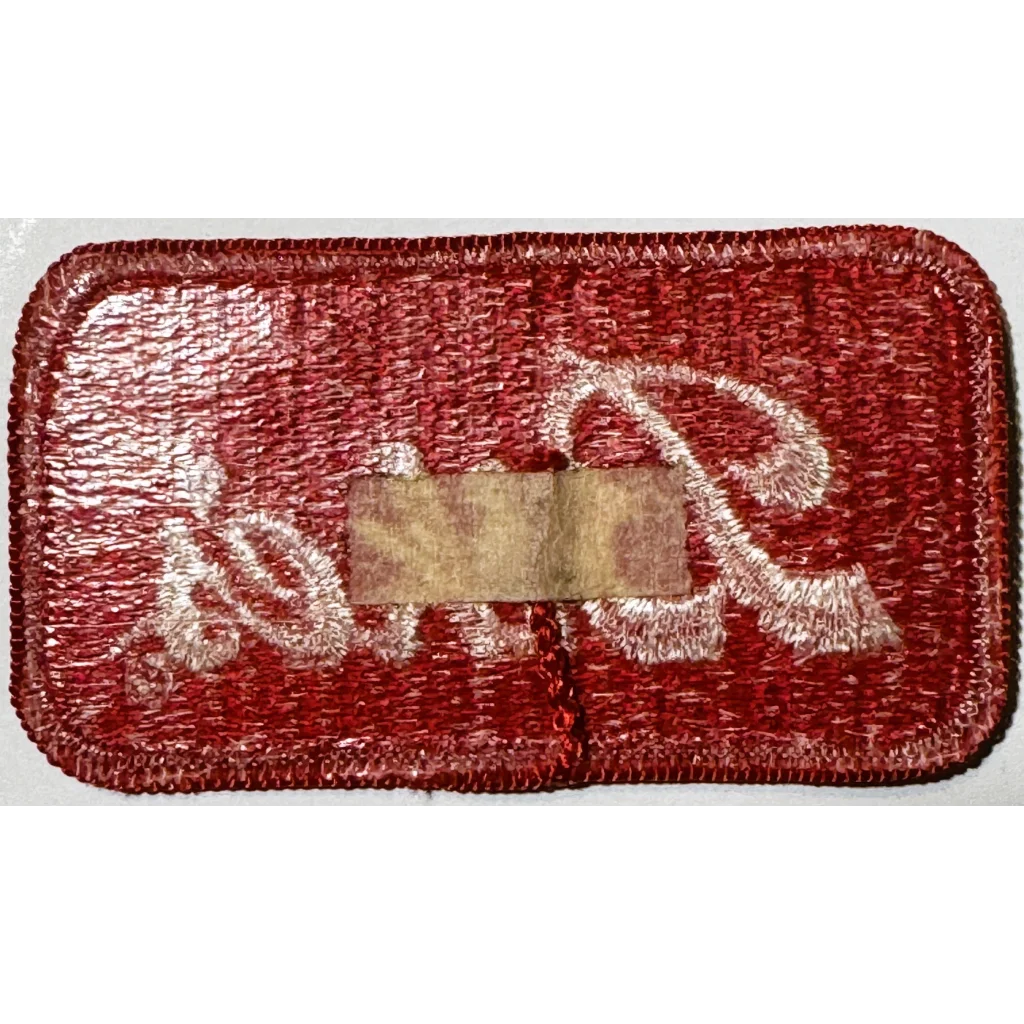 Red embroidered patch with white cursive lettering from Vintage Red Bikes product