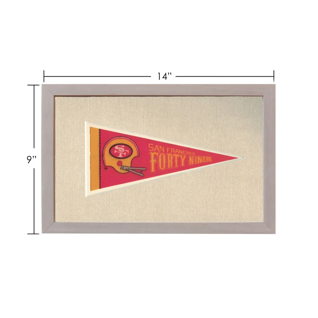 Vintage San Francisco 49ers pennant in red and gold frame