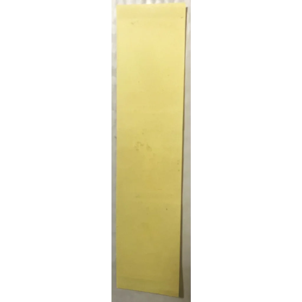 Yellow sticky note pad perfect for adding Tots Stickers or Pail Kids nostalgia to any space