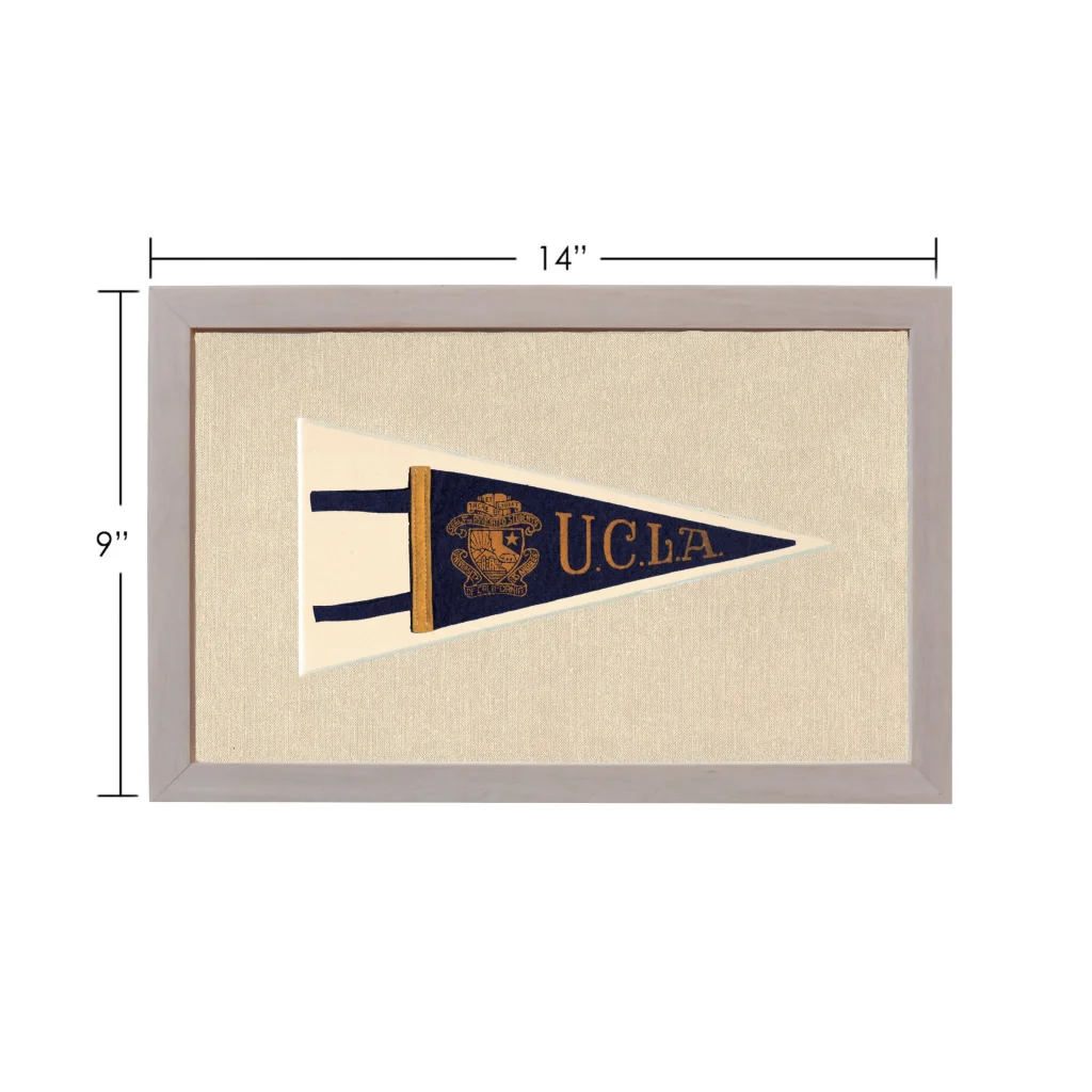 Vintage UCLA pennant in navy blue and cream, 14x9 inch gray frame