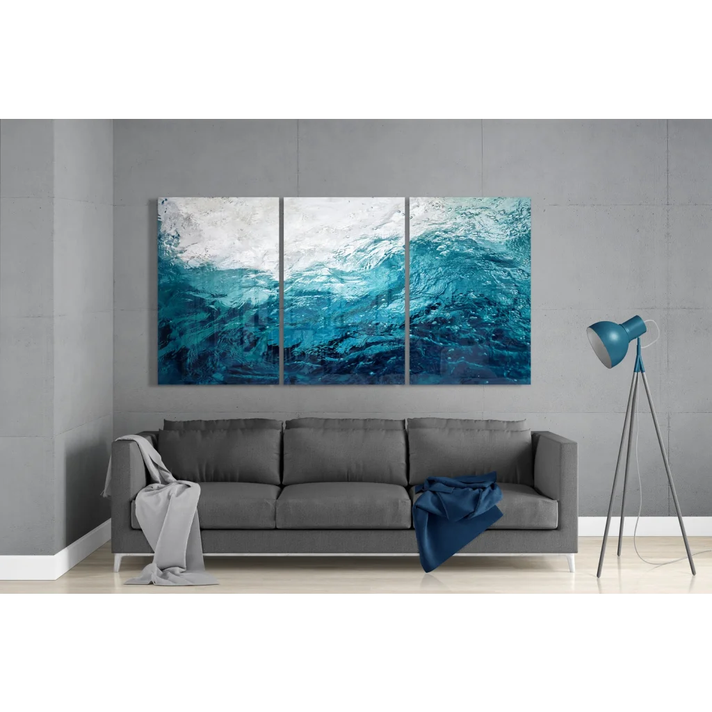 Stunning turquoise wave Insigne glass art triptych on sofa