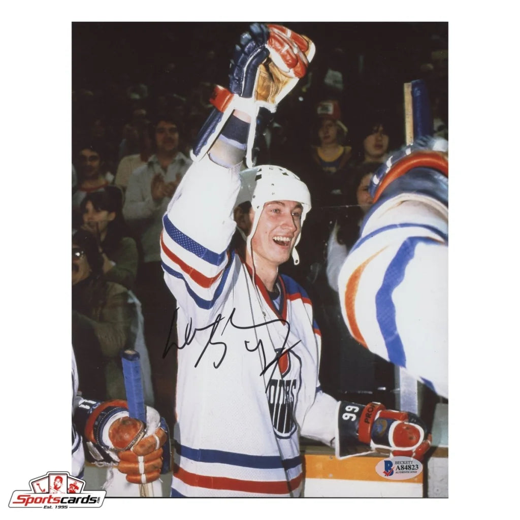 Wayne Gretzky signed white hockey jersey photo with Beckett authentication