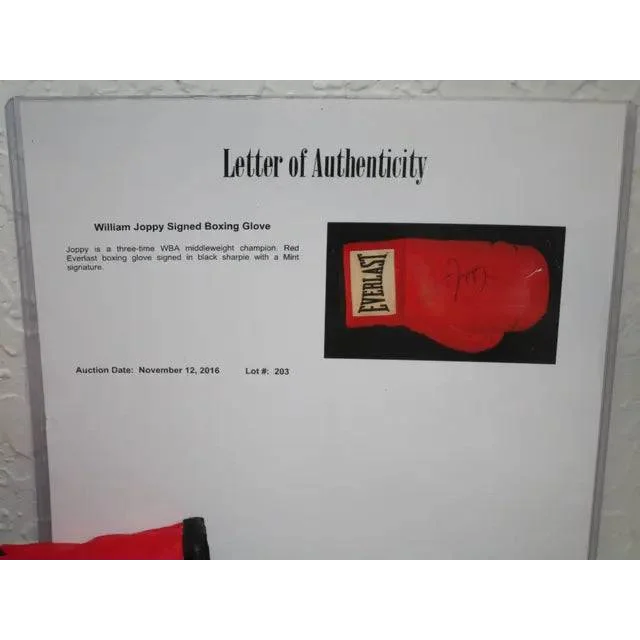 Letter of authenticity for William Joppy autographed boxing glove with certificate