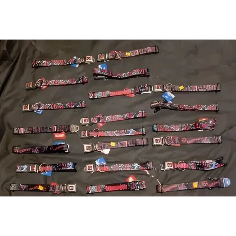 Assorted patterned dog collars with Deadpool Marvel buckles and metal hardware