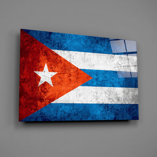 Cuban flag glass wall art displaying red, white, and blue horizontal stripes with white star, mounted at angle against gray wall.