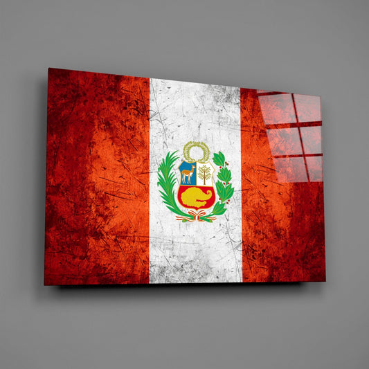 Angled view of a glass wall art panel displaying Peru's flag with red-white-red vertical stripes, coat of arms, and distressed texture against gray background.