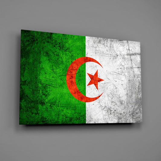 Algerian flag glass wall art displayed at an angle against a gray wall, showing green, white, and red sections with a red crescent and star symbol.