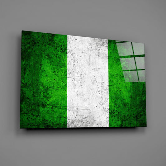 Angled view of Nigerian flag glass wall art displaying green, white, and green vertical stripes with textured surface and grid pattern on right panel.