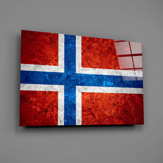 Weathered Norway flag glass wall art with red, white, and blue Nordic cross design displayed at an angled perspective against gray background.