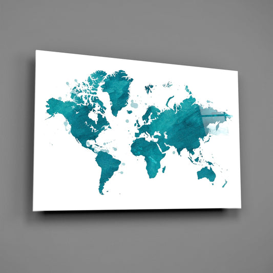 Teal watercolor world map on white glass panel displayed at an angle against gray background.