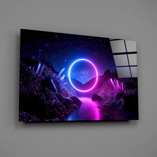 Glass wall art displaying a glowing neon blue and pink circle in a cosmic landscape, mounted at an angle on a gray wall.
