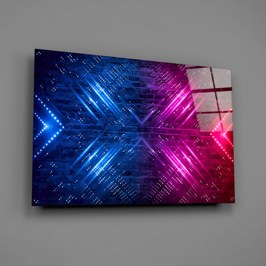Angled front view of glass wall art displaying neon blue and magenta arrows on dark brick texture against gray wall.