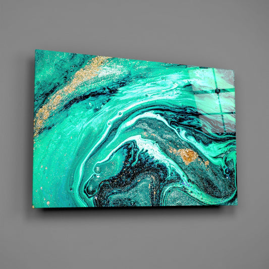 Angled front view of turquoise and black swirl glass art with gold leaf accents and air bubbles, mounted on gray wall.