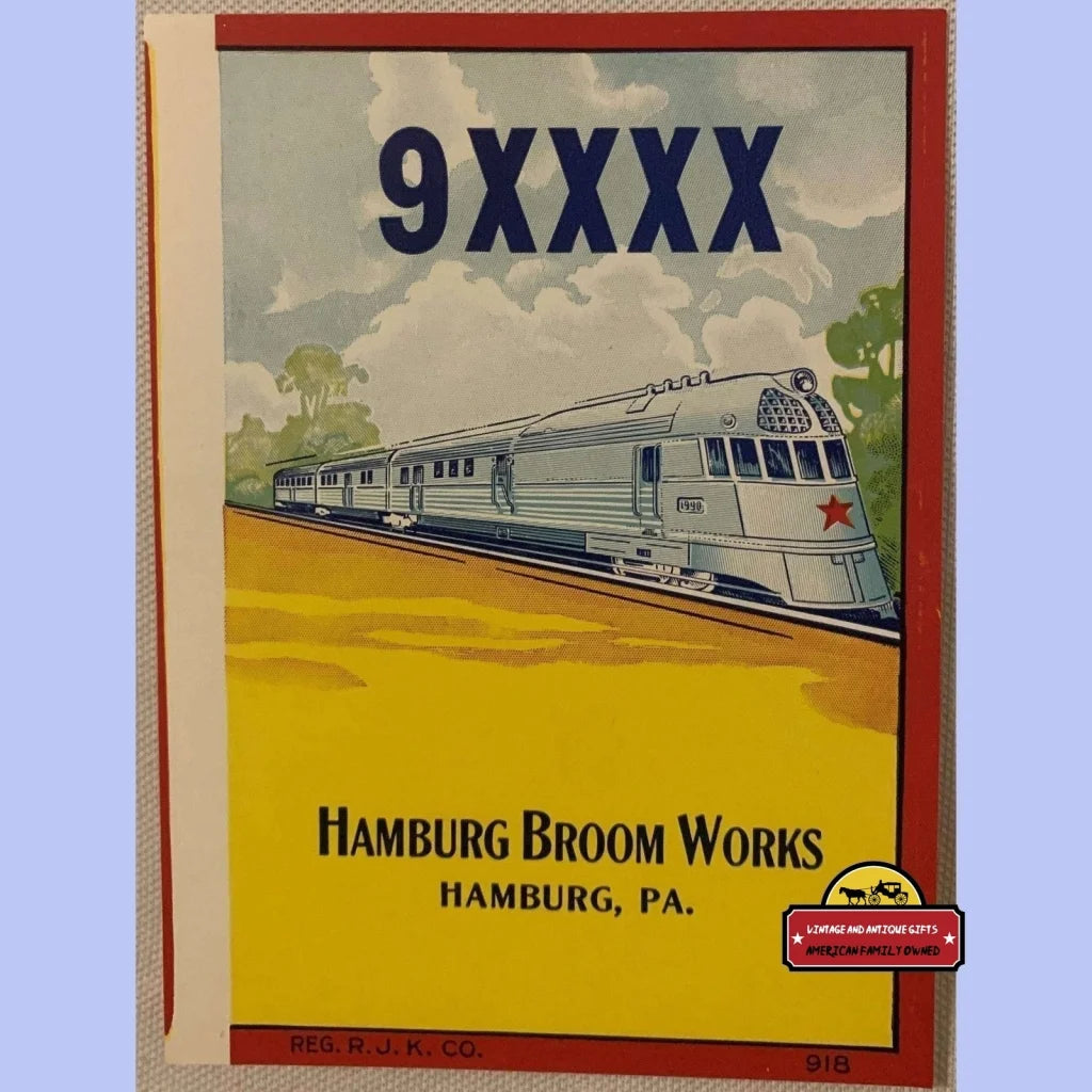 Vintage advertisement showcasing a streamlined passenger train on a rare locomotive broom label