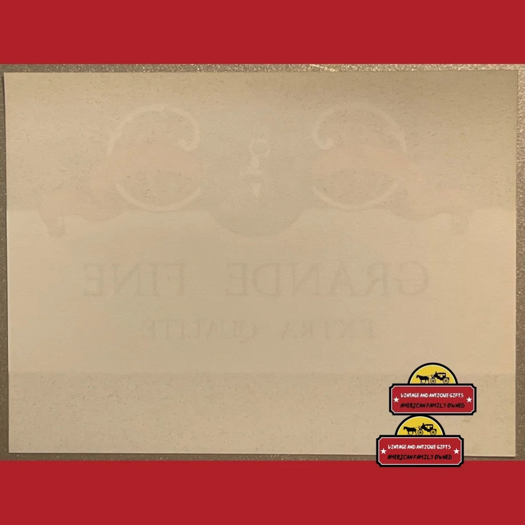 Beige sheet with red borders and speech bubbles for Antique Vintage Grande Wine Label