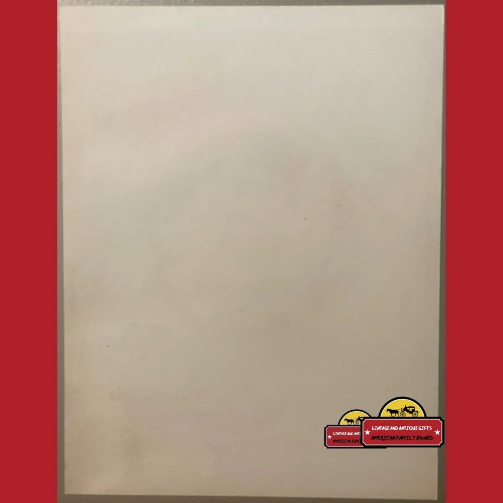 Beige background with a cute cartoon car sticker on a Rare 1970s Keana Rose syrup label