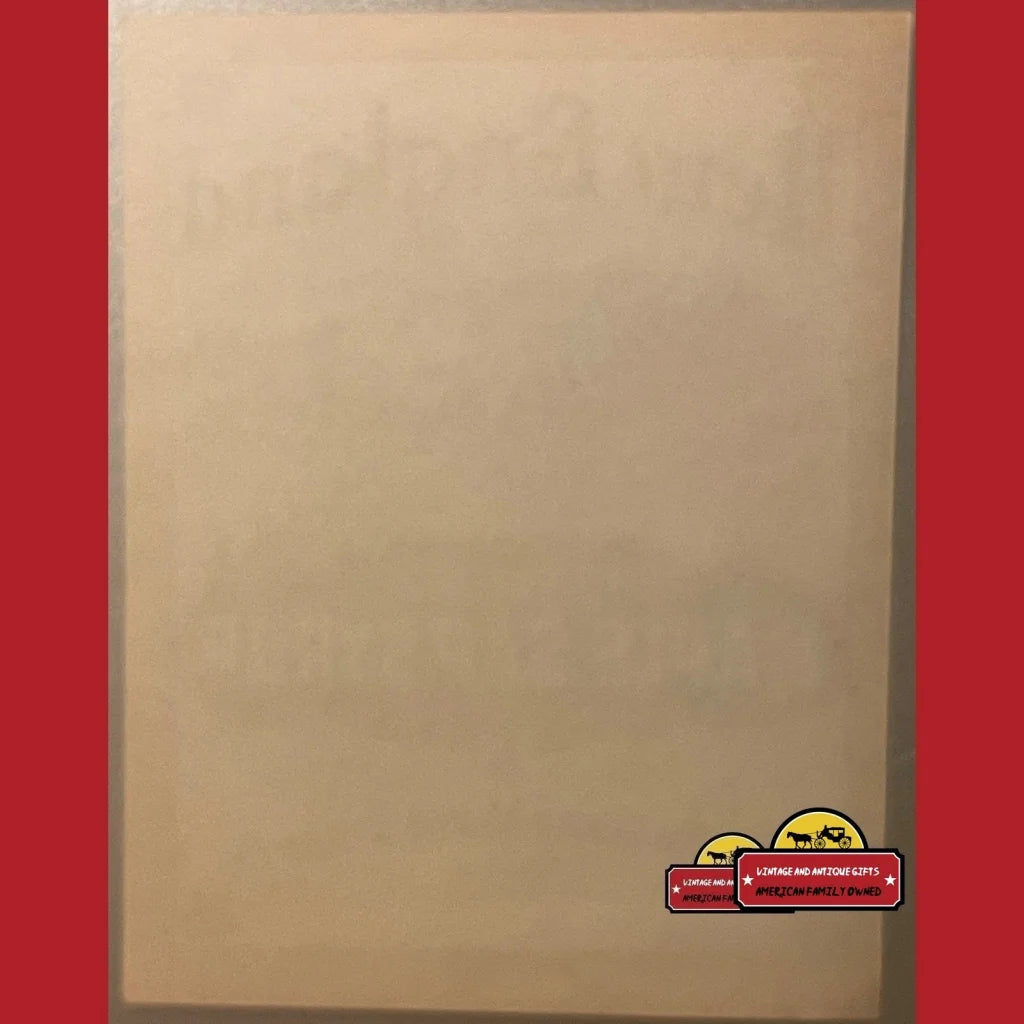 Blank beige canvas with a small cartoon car sticker and Vermont Maple Syrup label